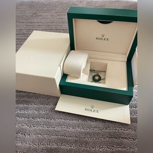 Rolex box in excellent condition- always been stored in outer box has no scuffs.